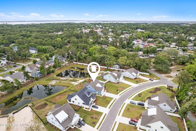 457 Raven Glen Dr, Southport, NC 28461 - aerial overview of property's location with a large body of water and nearby suburban area