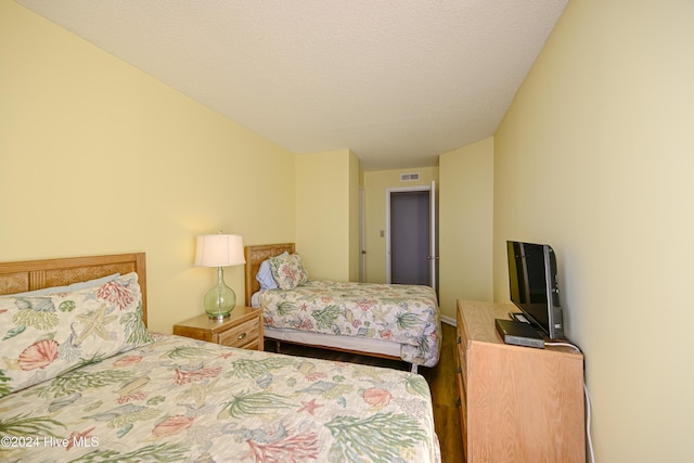 bedroom with a textured ceiling