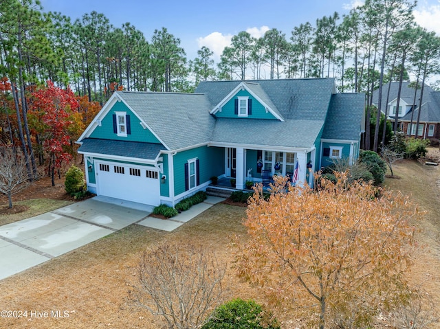 view of front facade featuring a front yard and covered porch