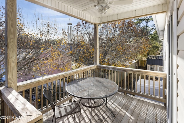 wooden deck with ceiling fan