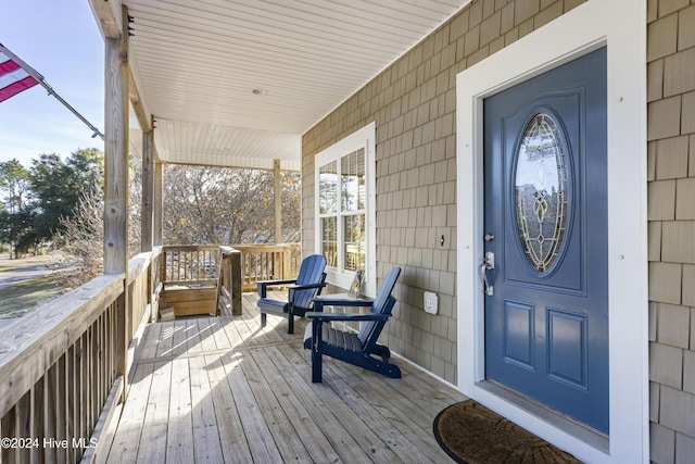 deck with covered porch