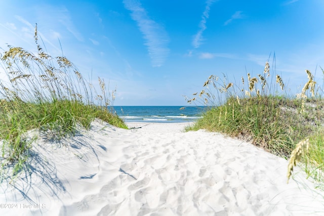 property view of water with a beach view