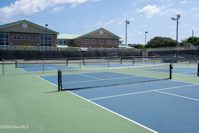 view of tennis court with basketball court