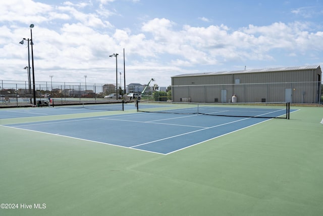 view of tennis court with basketball court