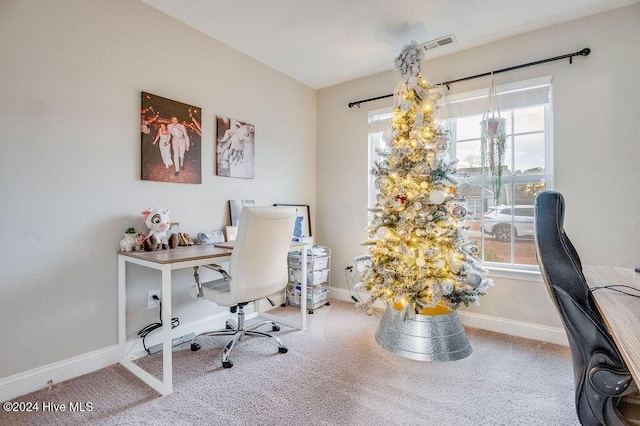 view of carpeted office space