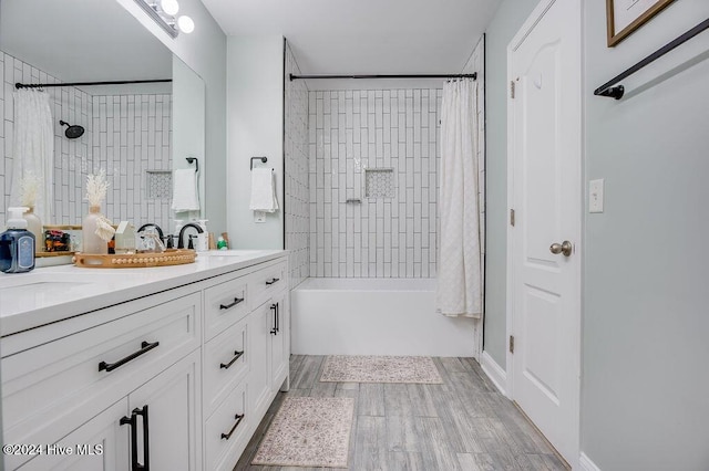 bathroom with shower / bath combo and vanity