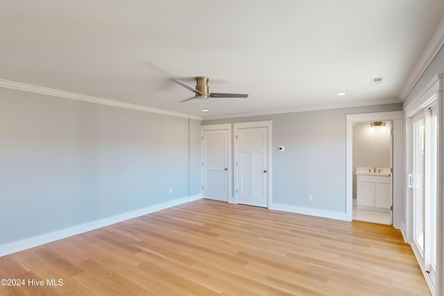 unfurnished bedroom with light hardwood / wood-style floors, ceiling fan, crown molding, and ensuite bathroom