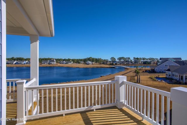 deck featuring a water view