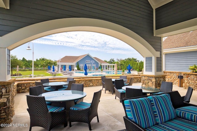 view of patio with a pool