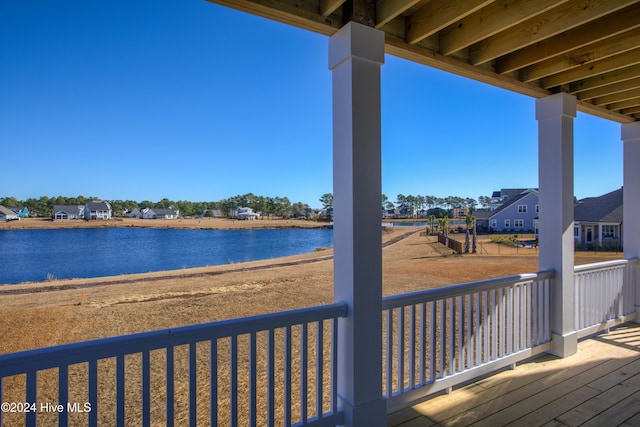 deck featuring a water view