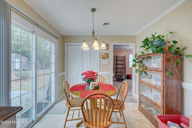 dining space with light carpet, crown molding, and a notable chandelier