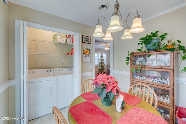 dining area with separate washer and dryer, crown molding, and ceiling fan with notable chandelier