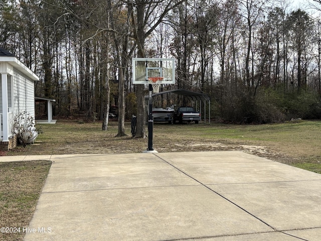 view of patio featuring a carport and driveway