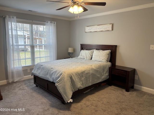 bedroom with ornamental molding, carpet flooring, and multiple windows