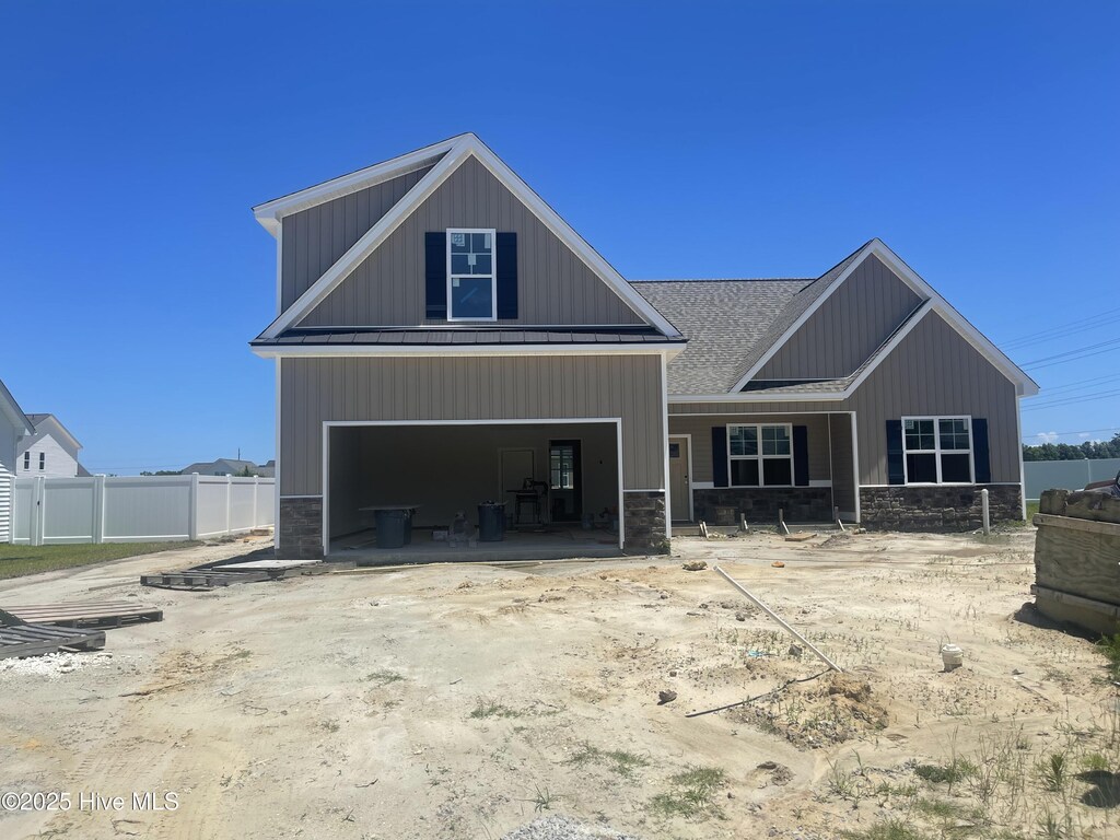 2817 Walbrook Ct, Winterville, NC 28590 - view of front of home with a garage and board and batten siding