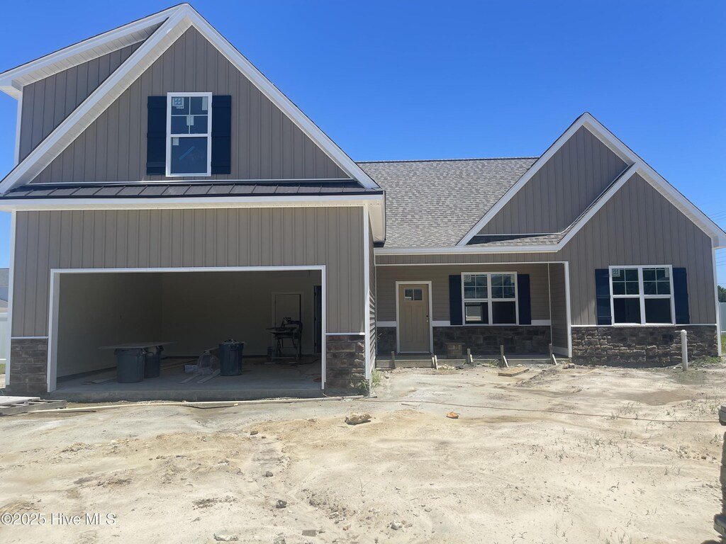 2817 Walbrook Ct, Winterville, NC 28590 - craftsman-style home featuring a standing seam roof, board and batten siding, a shingled roof, and metal roof
