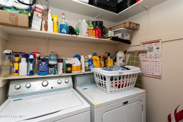 laundry area with washing machine and dryer