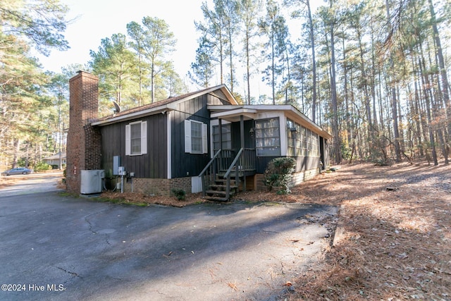 view of front of house with cooling unit