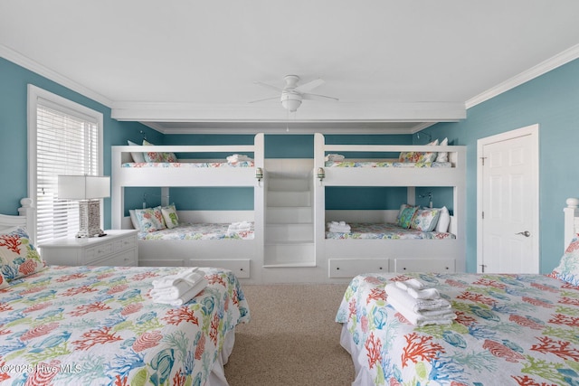 bedroom featuring ceiling fan, carpet floors, and crown molding