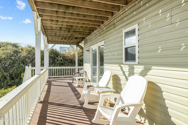 wooden balcony featuring a wooden deck