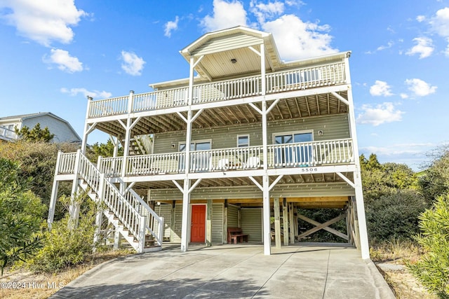 coastal home featuring a carport