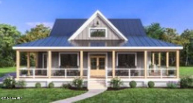 farmhouse-style home featuring a front lawn and covered porch