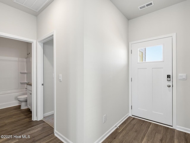 194 N Atlantic Ave Lot 128, Wilmington, NC 28411 - foyer featuring baseboards, dark wood-style floors, and visible vents