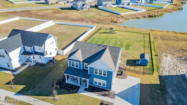 drone / aerial view with a water view