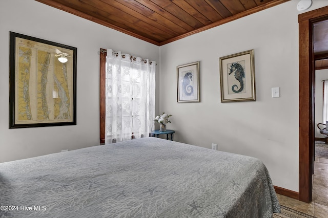 bedroom featuring crown molding and wooden ceiling