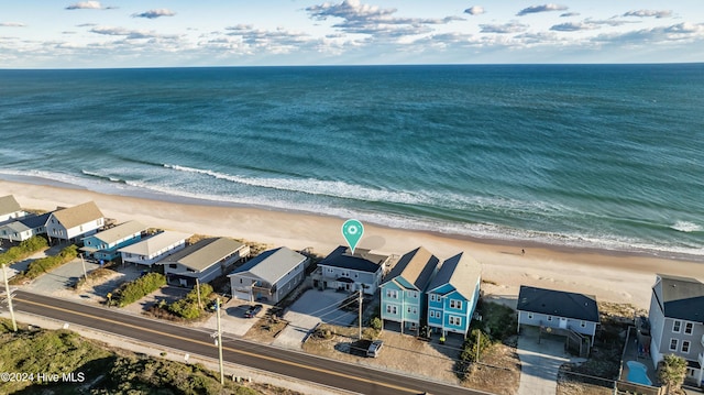 aerial view featuring a beach view and a water view