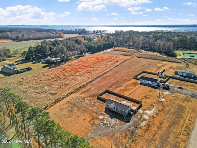 birds eye view of property with a rural view