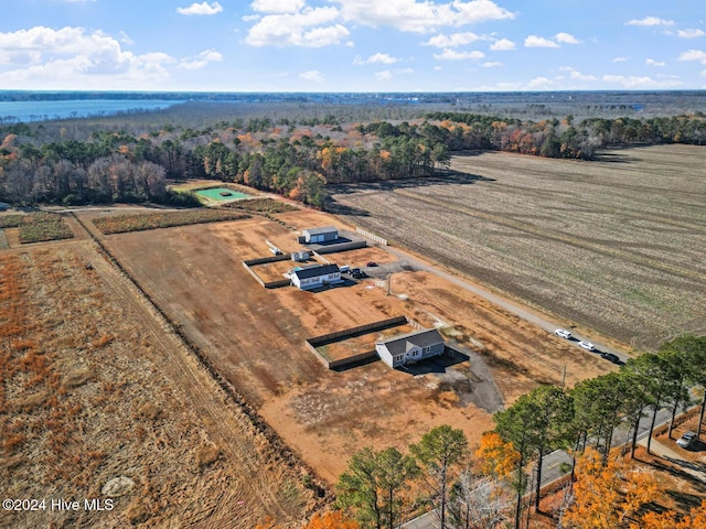 birds eye view of property with a rural view