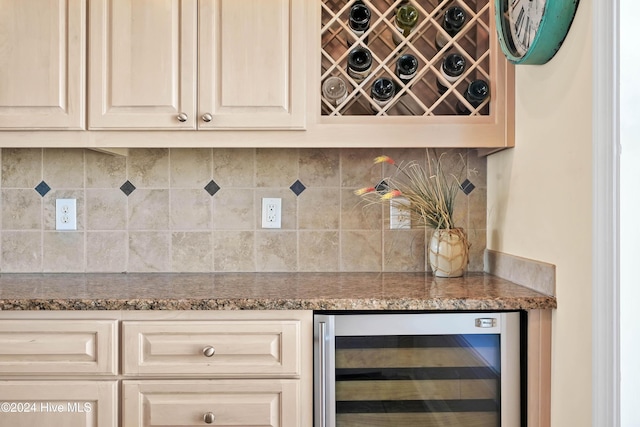 bar with backsplash and beverage cooler