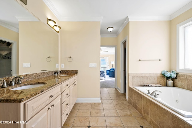 bathroom with vanity, tiled tub, ornamental molding, and tile patterned floors