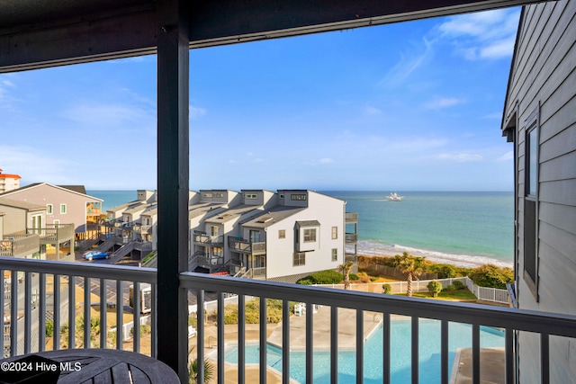 property view of water featuring a beach view