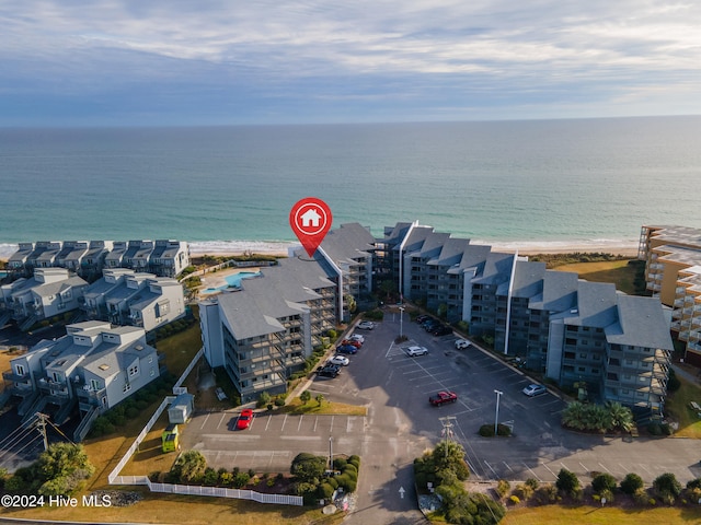 bird's eye view with a beach view and a water view