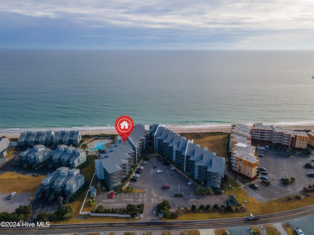 aerial view with a beach view and a water view