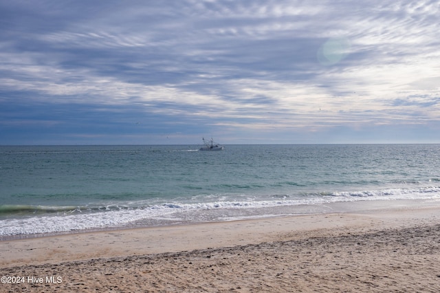 property view of water featuring a view of the beach