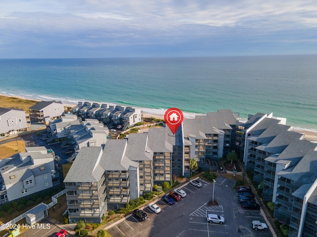 bird's eye view with a view of the beach and a water view