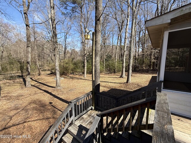 single story home with a porch