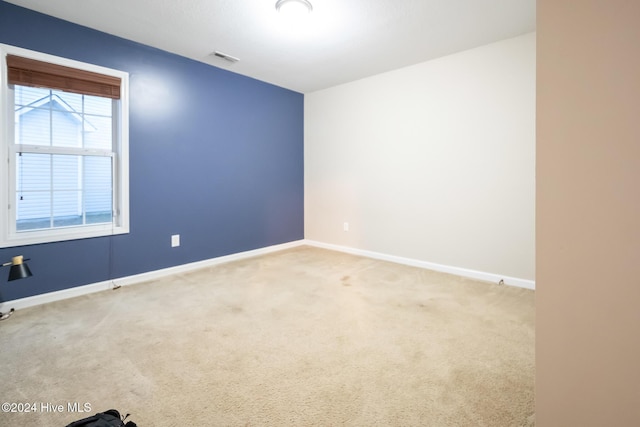 empty room with light carpet