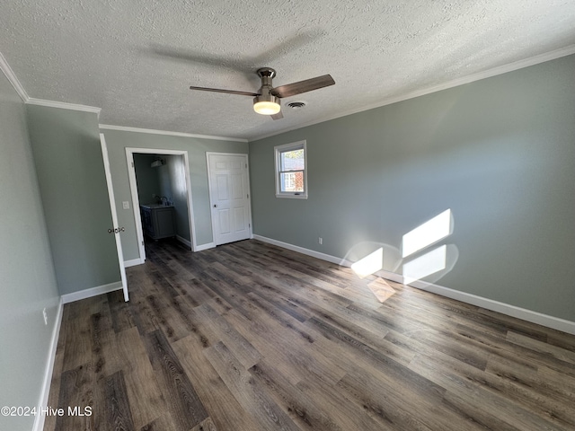 unfurnished bedroom featuring ornamental molding, a textured ceiling, ceiling fan, dark hardwood / wood-style floors, and a closet