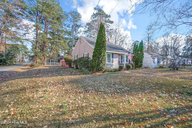 view of home's exterior featuring a yard