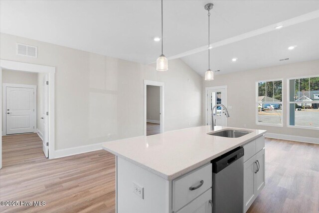 unfurnished living room featuring lofted ceiling and light hardwood / wood-style floors