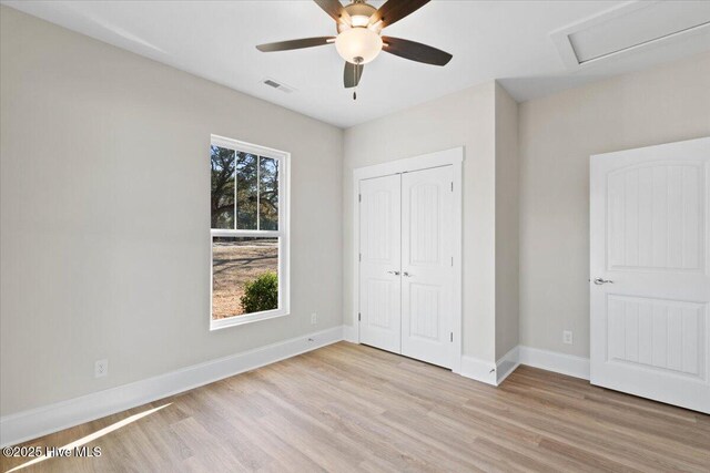 spacious closet featuring hardwood / wood-style floors