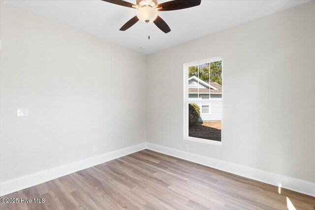 full bathroom featuring vanity, shower / bathing tub combination, wood-type flooring, and toilet