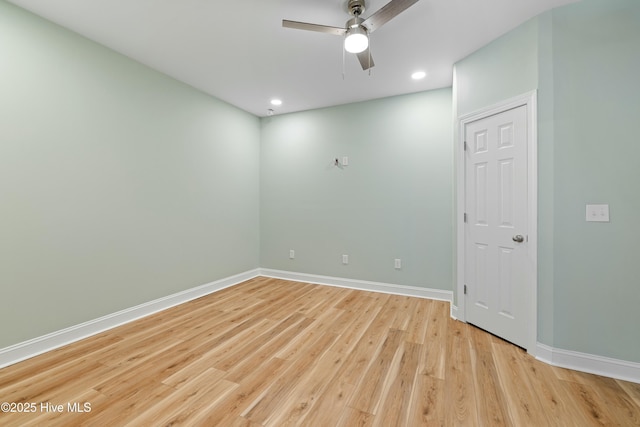 spare room with recessed lighting, baseboards, ceiling fan, and light wood finished floors