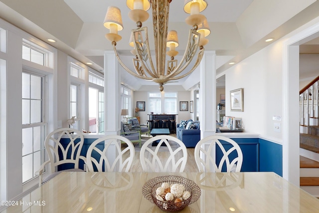 dining area with stairs, recessed lighting, and a notable chandelier