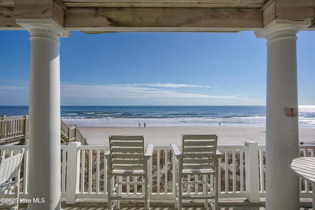 exterior space with a beach view