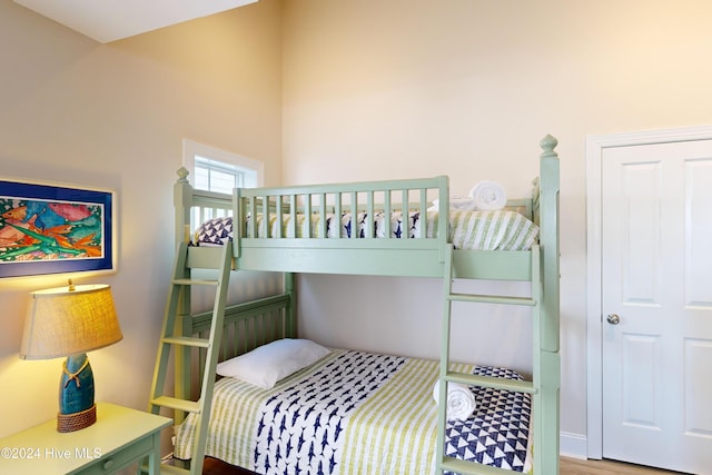 bedroom featuring wood finished floors